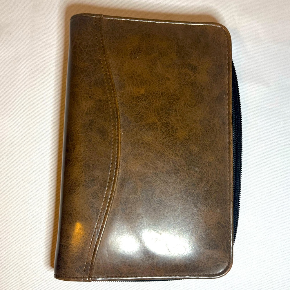 Day Timer Brown Folder With Some Papers